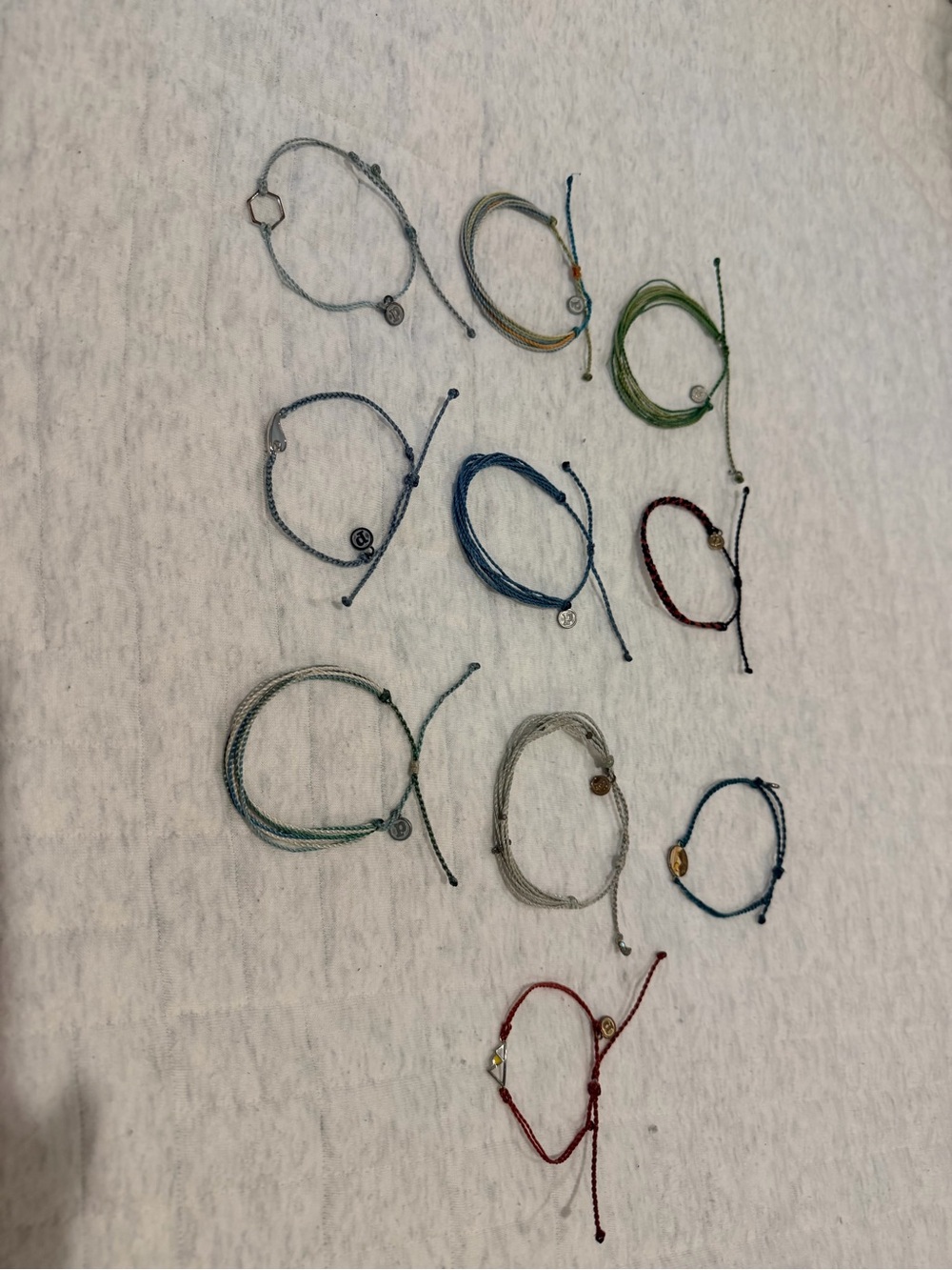 10 assorted Pura Vida bracelets